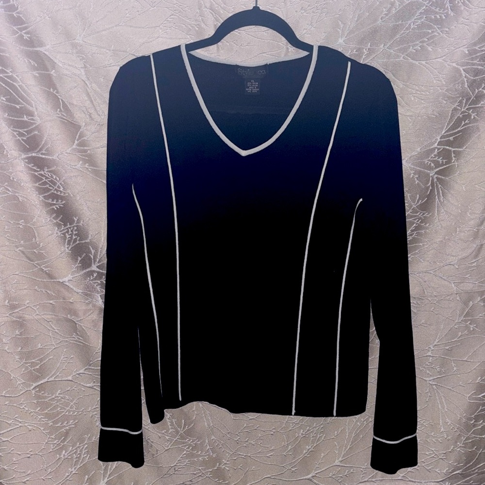 Beautiful style and company stretchy black sweater.